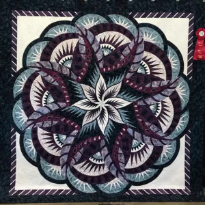 2022 SECOND PLACE-Large Pieced by Two or More-Coral Reef-Darci Mead-Quilted by Paula Ross of The Crimson Cabinet