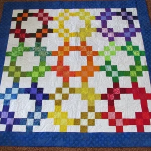 colorful quilt with blue border