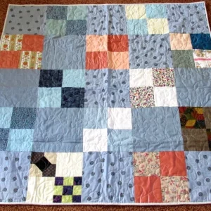 light blue patchwork quilt