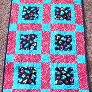 hot pink and neon blue square patterned quilt