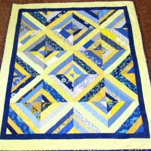 blue yellow and navy quilt