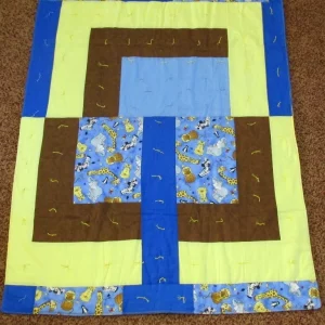 blue, yellow and brown patchwork quilt