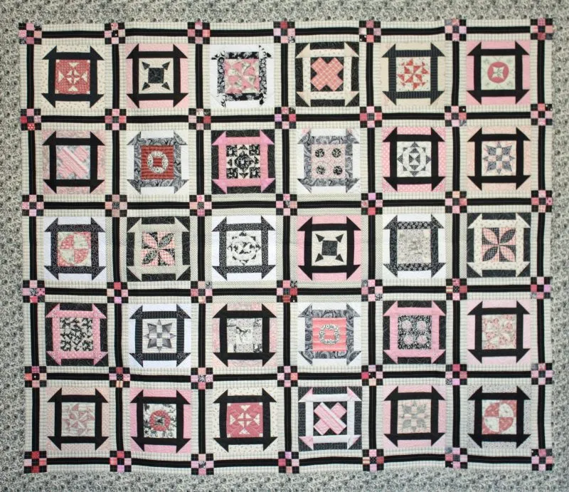 2nd Place - Medium Pieced by 1; "Jane Come of Age" by Cynthia Fuelling, track machine quilted.