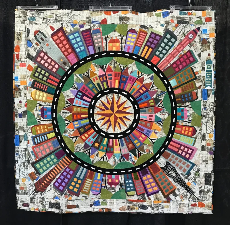 2022 HONORABLE MENTION-Medium Pieced by Two or More-Color My World My Way-Cheryl Little-Quilted by Jami Herndon