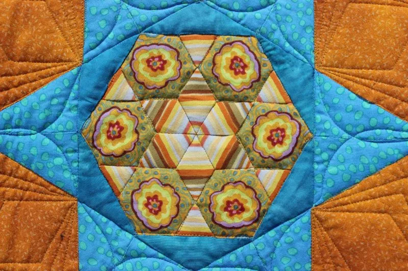 "The New Hexagon Milliefiore" close-up; pieced and track machine quilted by Ruth Mickelson. 2nd place Large Pieced by One