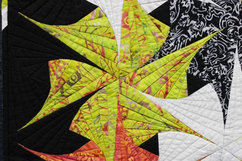 "Twist 'n Shout" close-up; pieced and stationary machine quilted by Sharon Beidler. 3rd place in Small Pieced by One.