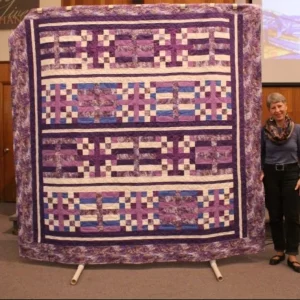 Purple Stash by Donna Swanson. Designed and quilted by Donna Swanson and is a wedding gift for Ilya & Sasha, Young Life leaders in Bishkek, Kyrgyzstan.