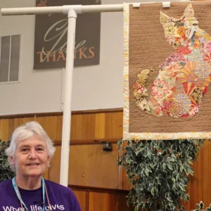 Deb Smith made her Cat Quilt at a collage class at Quilt Expressions. It was the first time she had made a collage quilt, ever used a walking foot and first time she tried to quilt. It looks great Deb!