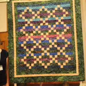 Jan Lundine made her Jelly Roll Mystery quilt in a class at Julia Zigler's.