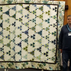 Scott and Shelley Weigt made this raffle quilt for the National Federation of the Blind in Idaho. The pattern, 