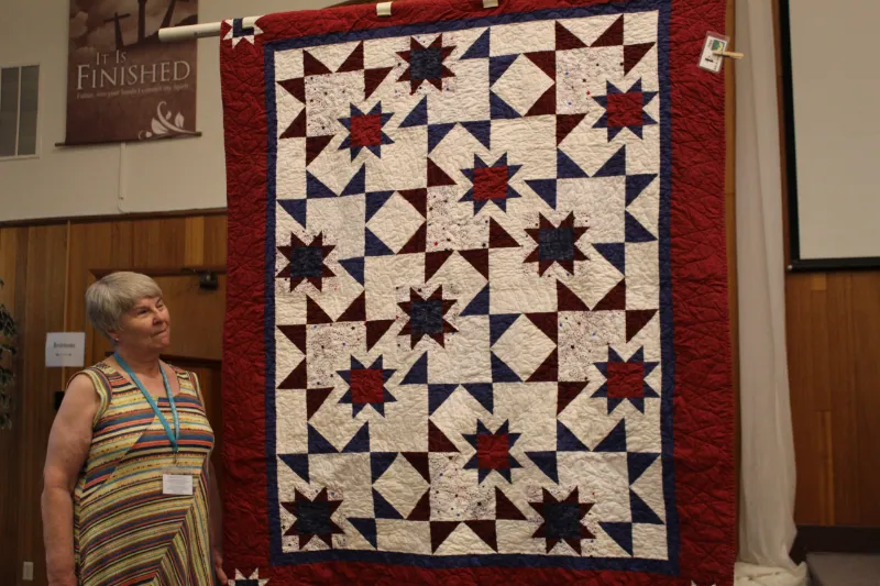 Nancy England made this Quilt of Valor called "Star Shuffle" from a pattern in the July/August 2018 McCall magazine.