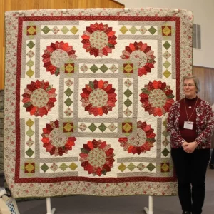 The Dresden Plate is one of Barbara Smith's favorite blocks. Sunflower Garden is her first for 2019. She used a special ruler for this project. She will have more Dresden plate quilts to share in the future!
