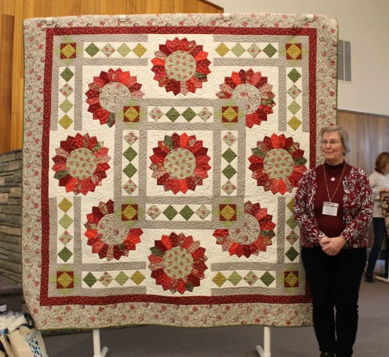 The Dresden Plate is one of Barbara Smith's favorite blocks. Sunflower Garden is her first for 2019. She used a special ruler for this project. She will have more Dresden plate quilts to share in the future!