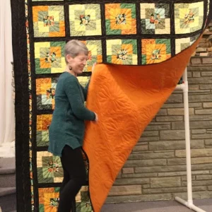 An original quilt that Donna Swanson and her daughter, Lara, made at quilt camp in Cascade. It will be donated to Young Life in Ukraine this Spring when Donna and her husband, Tom, travel there. The Ukrainians grow sunflower seeds and was inspiration for the quilt.
